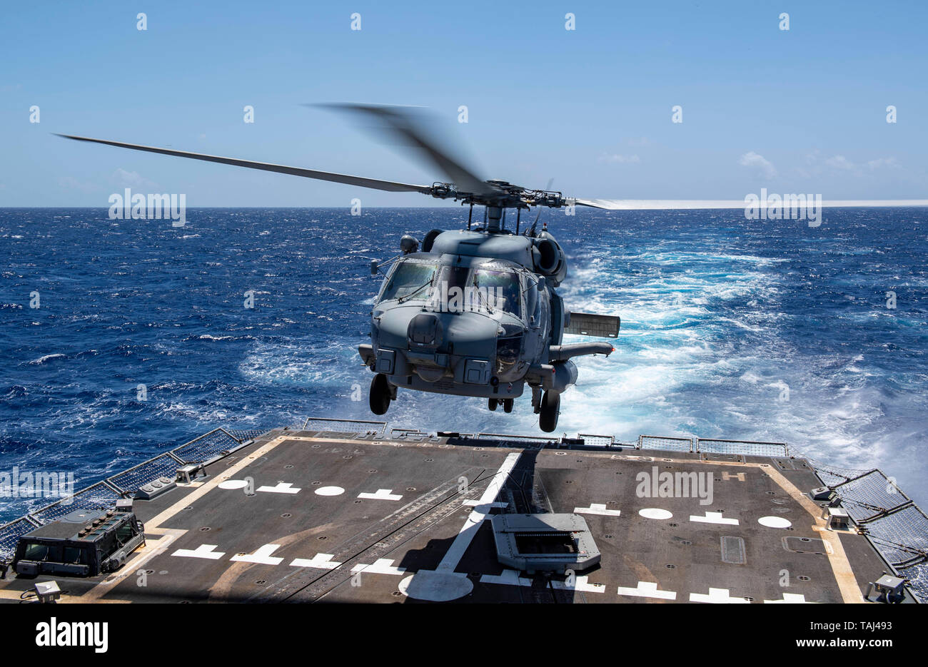 190523-N-NU281-1260 PACIFIC OCEAN (May 23, 2019) An MH-60R Sea Hawk, assigned to the 'Easyriders' of Helicopter Maritime Strike Squadron (HSM) 37, launches from the flight deck of the Arleigh Burke-class guided-missile destroyer USS Michael Murphy (DDG 112). Murphy is conducting routine operations in the eastern Pacific. (U.S. Navy photo by Mass Communication Specialist 2nd Class Justin R. Pacheco) Stock Photo