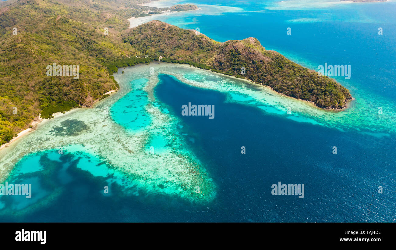 Islands of the Malayan archipelago with turquoise lagoons. Nature of