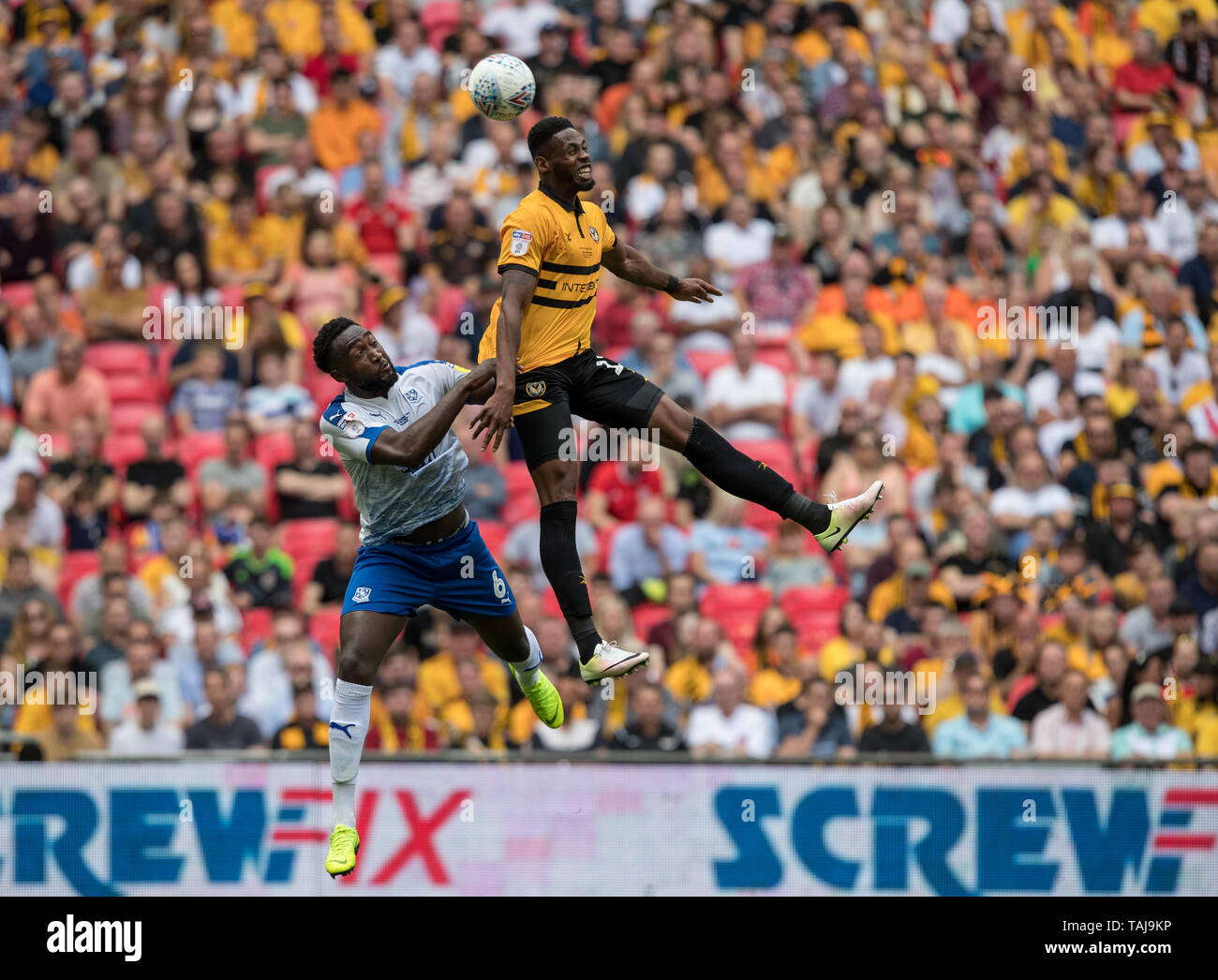 London, UK. 25th May, 2019. Jamille Matt of Newport County & Emmanuel Monthe of Tranmere Rovers during the Sky Bet League 2 Play-Off FINAL match between Newport County and Tranmere Rovers at Wembley Stadium, London, England on 25 May 2019. Photo by Andy Rowland. Credit: PRiME Media Images/Alamy Live News Stock Photo