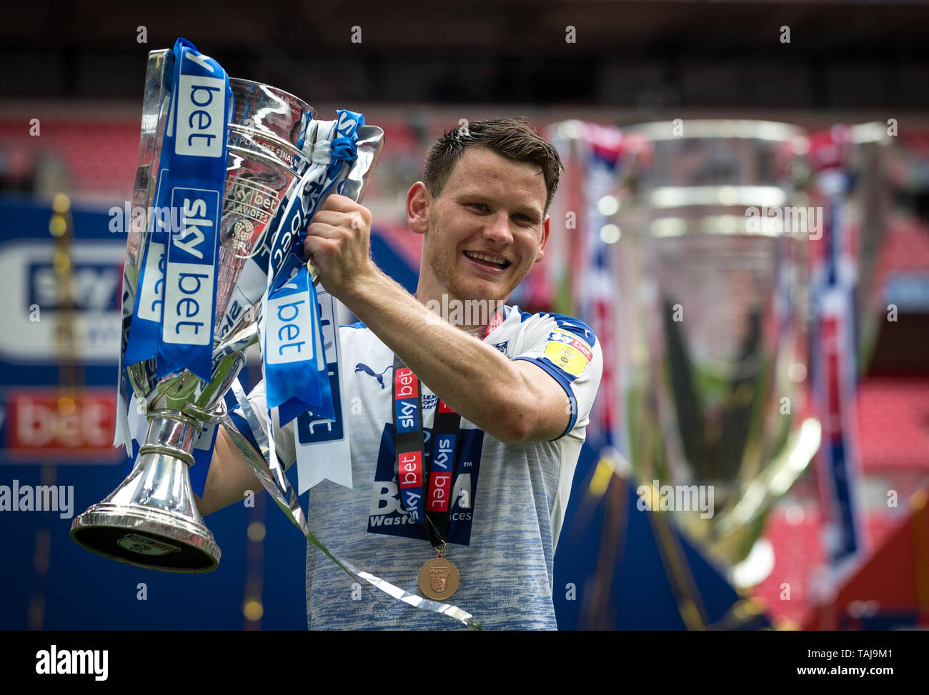 London, UK. 25th May, 2019. Winning goalscorer Connor Jennings of Tranmere Rovers with the trophy during the Sky Bet League 2 Play-Off FINAL match between Newport County and Tranmere Rovers at Wembley Stadium, London, England on 25 May 2019. Photo by Andy Rowland. Credit: PRiME Media Images/Alamy Live News Stock Photo