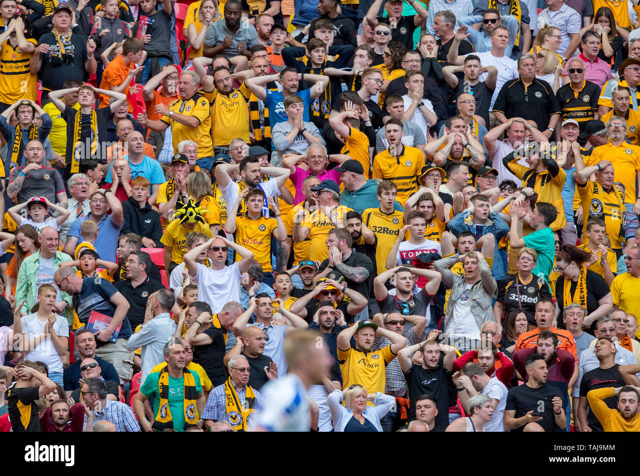 London, UK. 25th May, 2019. Newport County supporters during the Sky Bet League 2 Play-Off FINAL match between Newport County and Tranmere Rovers at Wembley Stadium, London, England on 25 May 2019. Photo by Andy Rowland. Credit: PRiME Media Images/Alamy Live News Stock Photo