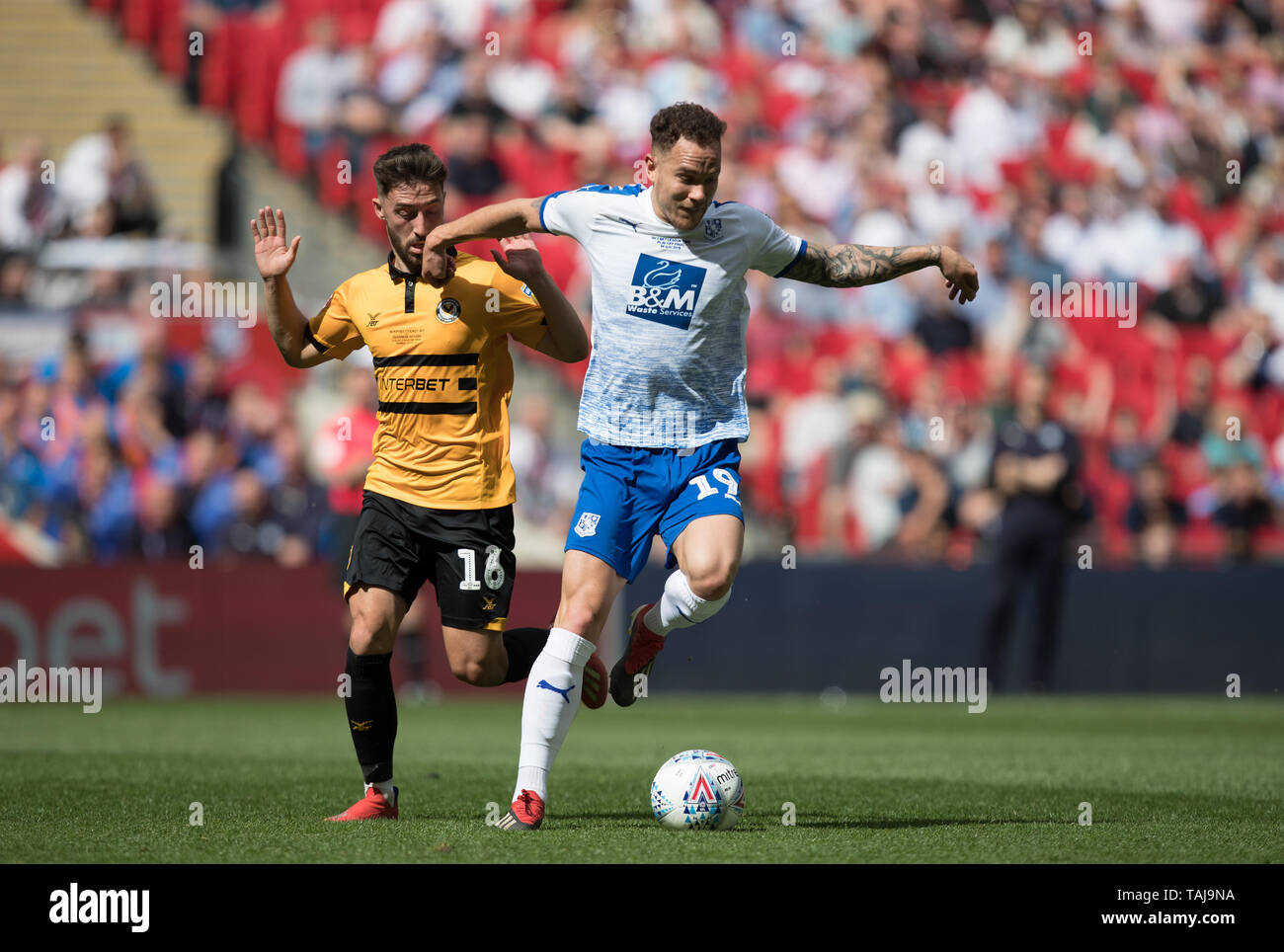 London, UK. 25th May, 2019. Kieron Morris (on loan from Walsall) of Tranmere Rovers & Josh Sheehan of Newport County during the Sky Bet League 2 Play-Off FINAL match between Newport County and Tranmere Rovers at Wembley Stadium, London, England on 25 May 2019. Photo by Andy Rowland. Credit: PRiME Media Images/Alamy Live News Stock Photo