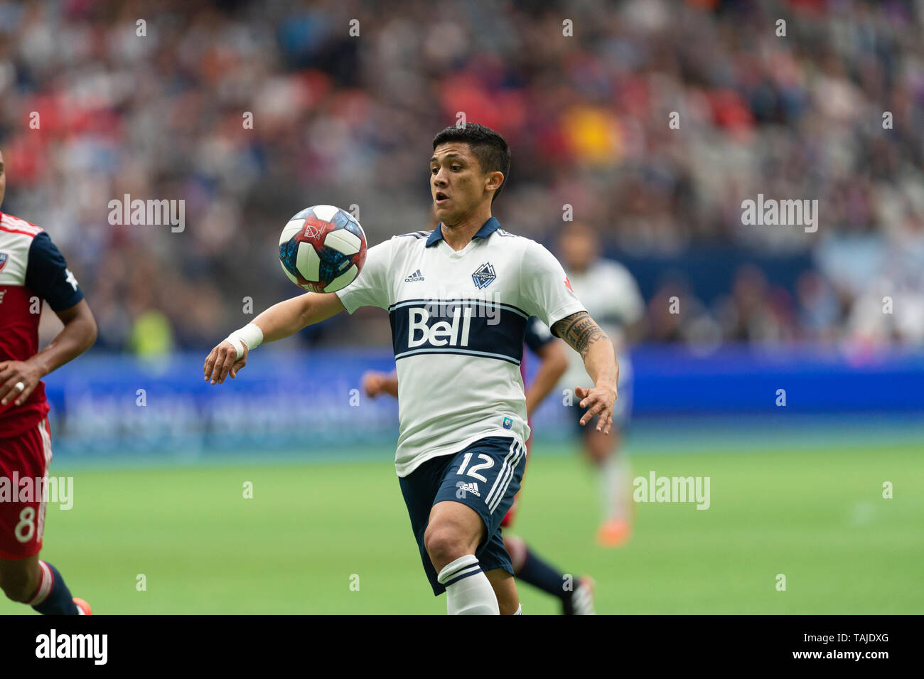 Vancouver, Canada. 25 May 2019. Fredy Montero (12) of Vancouver Whitecaps, attempting control of the ball. Final Score Vancouver 2 Dallas 1. MLS Soccer Vancouver Whitecaps vs FC Dallas at BC Place Stadium Vancouver Canada.  © Gerry Rousseau/Alamy Live News Stock Photo