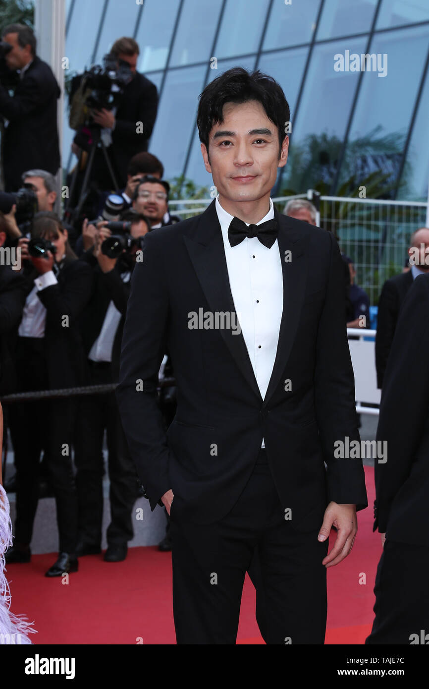 Cannes, France. 24th May, 2019. Actor Li Guangjie poses on the red ...