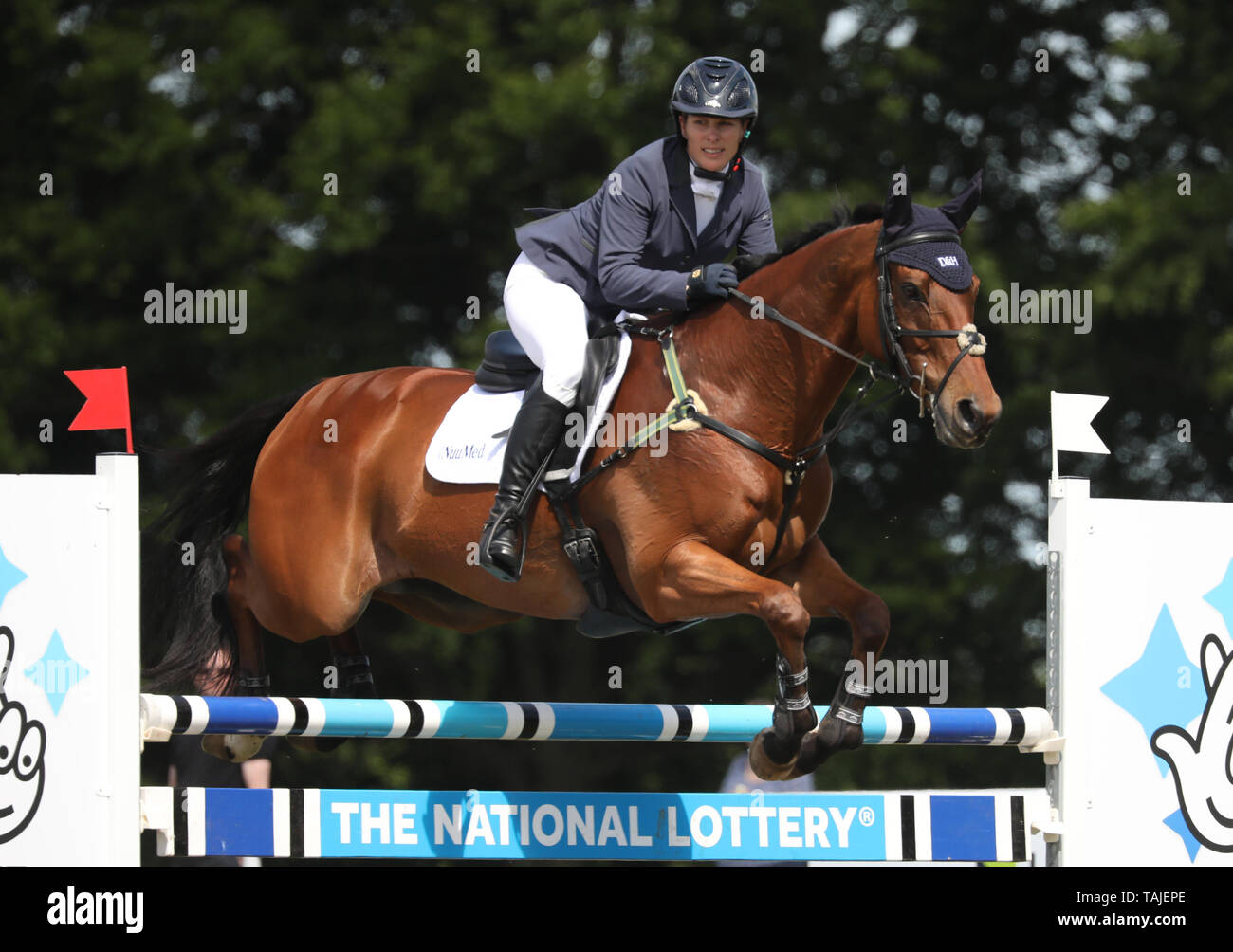 Houghton, UK. 25th May, 2019. Zara Tindall puts Watkins through the