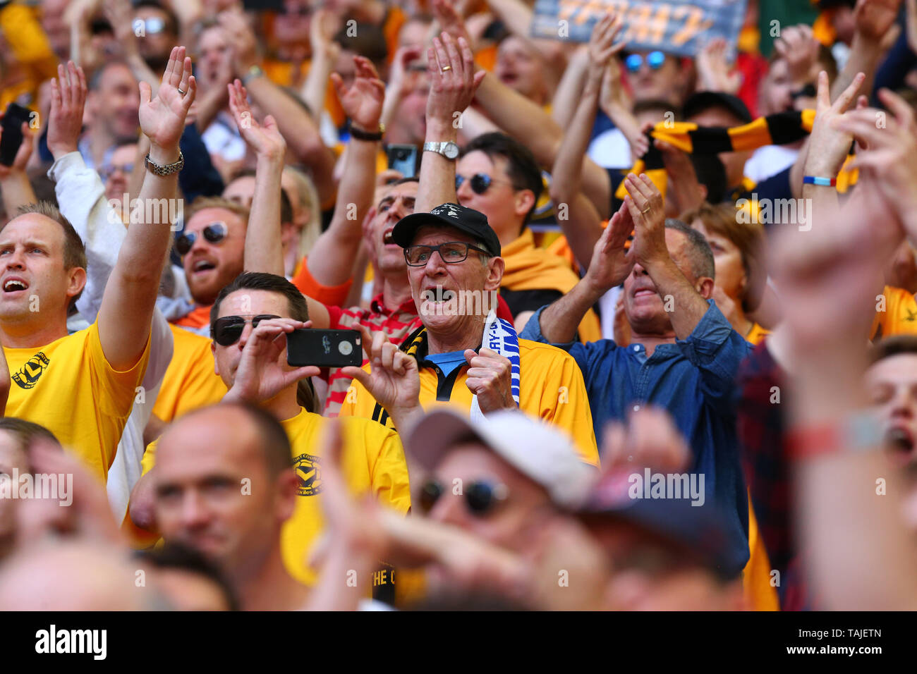 County fans in good voice during the EFL Sky Bet League 2 Play-Off Final match between Newport County and Tranmere Rovers at Wembley Stadium, London, England on 25 May 2019. Photo by Dave Peters.  Editorial use only, license required for commercial use. No use in betting, games or a single club/league/player publications. Stock Photo