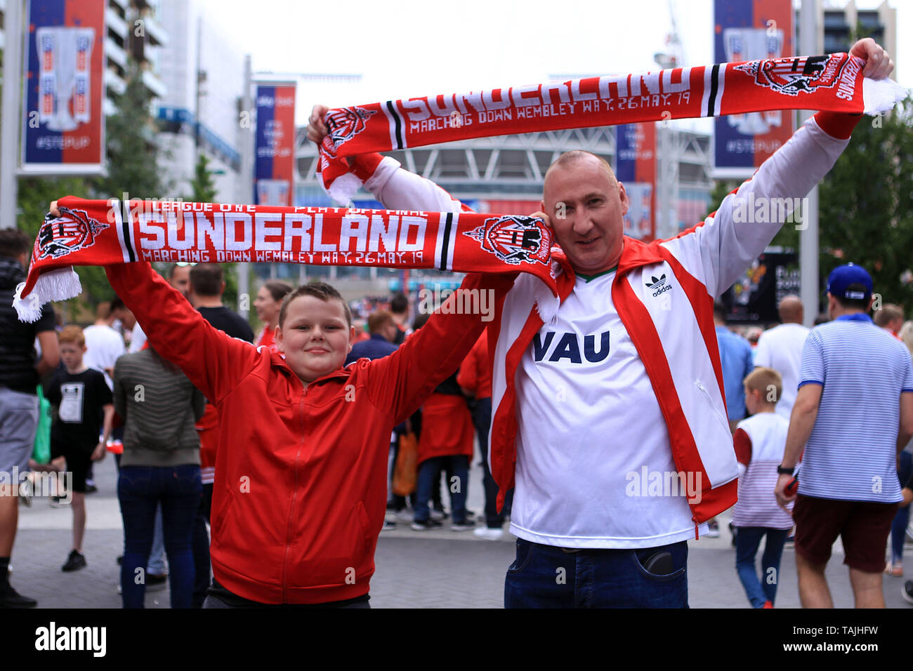 London, UK. 26th May, 2019. two Sunderland fans hold up their scarves outside of Wembley Stadium. Skybet football league one play off final, Charlton Athletic v Sunderland at Wembley Stadium in London on Sunday 26th May 2019.  this image may only be used for Editorial purposes. Editorial use only, license required for commercial use. No use in betting, games or a single club/league/player publications . Credit: Andrew Orchard sports photography/Alamy Live News Stock Photo