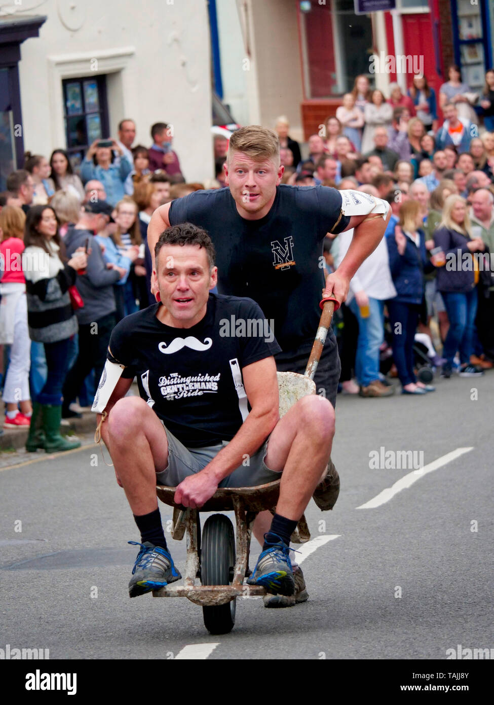 News UK: Wirksworth wheelbarrow race, 25th May 2019 Derbyshire Dales, Peak District, Derbyshire, England, UK Stock Photo