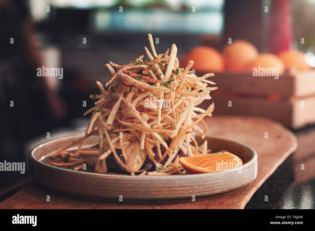 Healthy lean grilled mediumrare beef steak served with mustard sauce