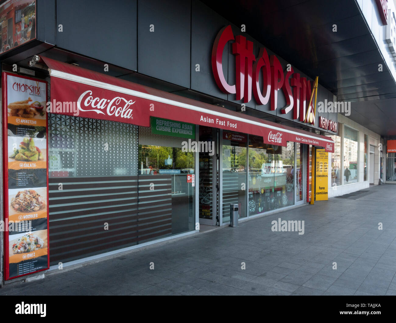 Exterior of and entrance to Chopstix, an Asian Fast Food franchise in the Old Town area of central Bucharest, Romania Stock Photo