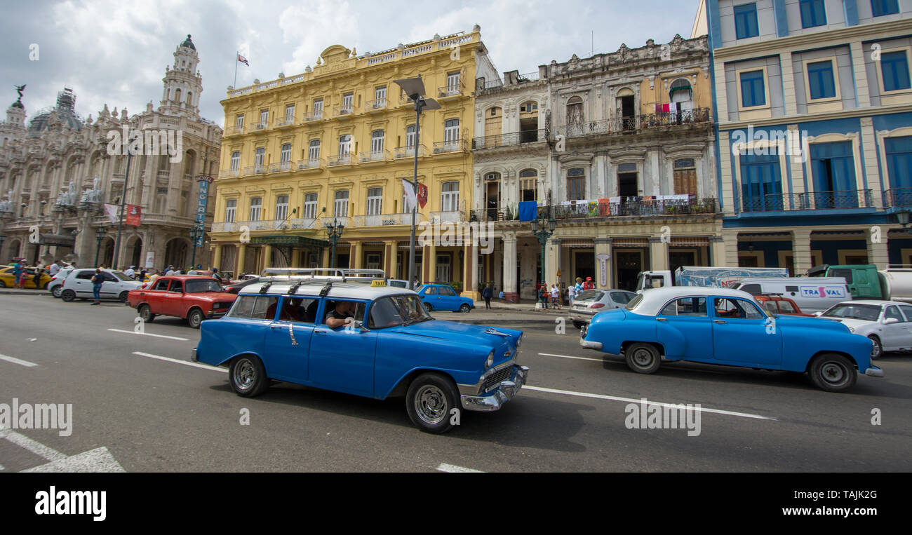 Havana, Cuba - A taxi drives on Paseo de Martí near Parque Central (Central Park). Classic American cars from the 1950s, imported before the U.S. emba Stock Photo