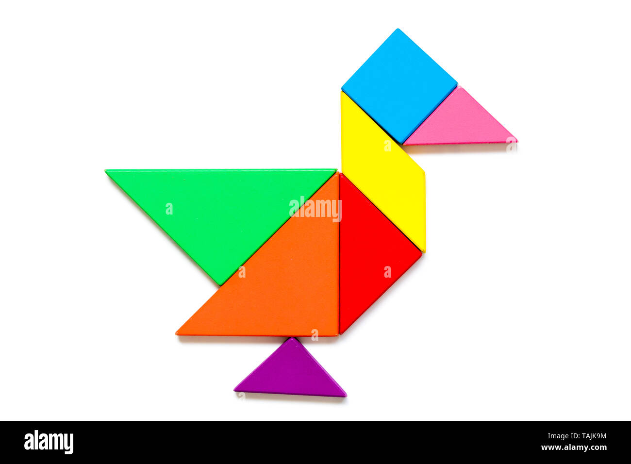 Color wood tangram puzzle in duck shape on white background Stock Photo -  Alamy