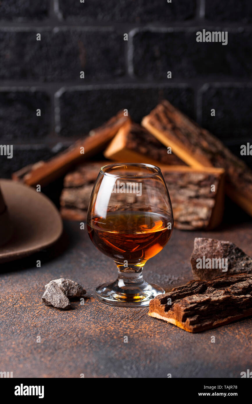 Glass of cognac or whiskey Stock Photo Alamy