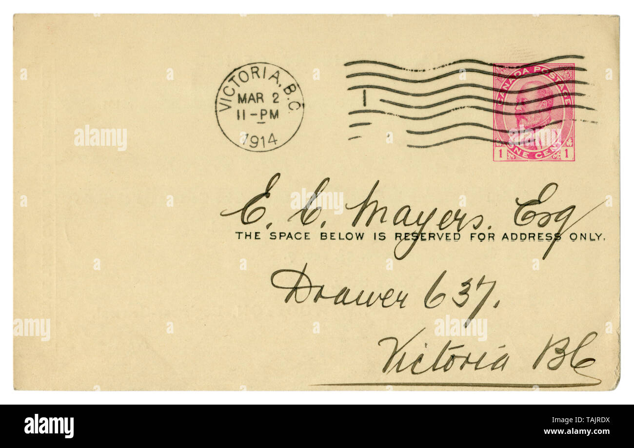 Victoria, British Columbia, Canada, 2 March 1914: Canadian historical Post Card with black ink writing cursive, Imprinted pink postage stamp one cent Stock Photo