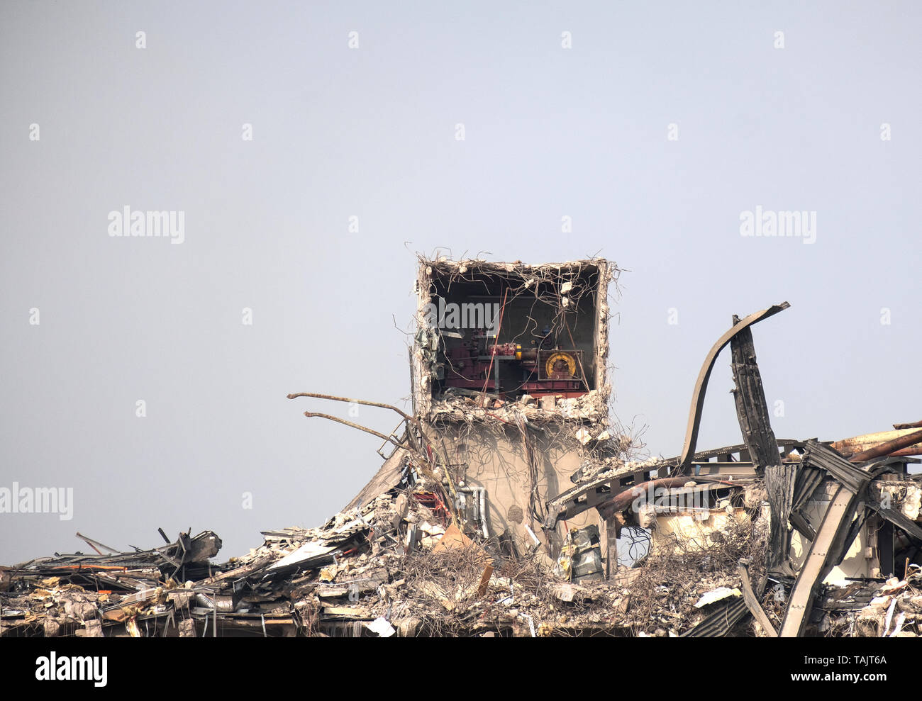 Factory structure exposed during demolition Stock Photo - Alamy