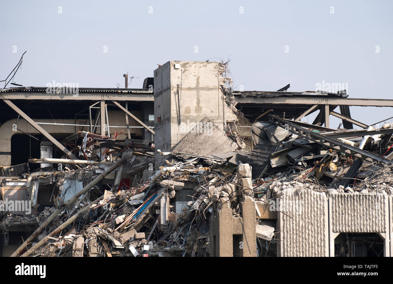 Factory structure exposed during demolition Stock Photo - Alamy