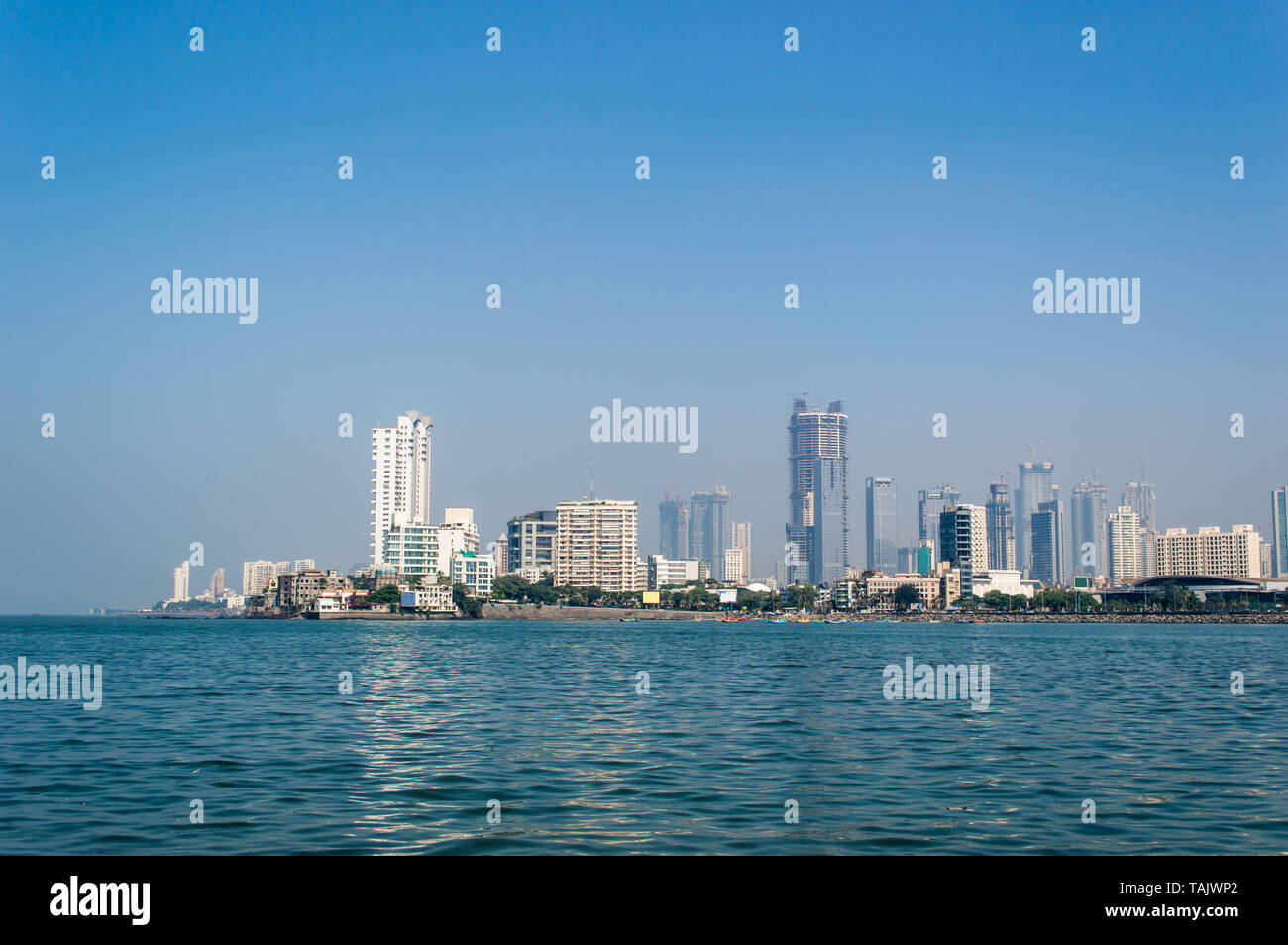Mumbai Haji Ali Bay Maharashtra. Landscape image of tall buildings of Mumbai city taken from Haji Ali dargah situated in  Arabian sea Stock Photo