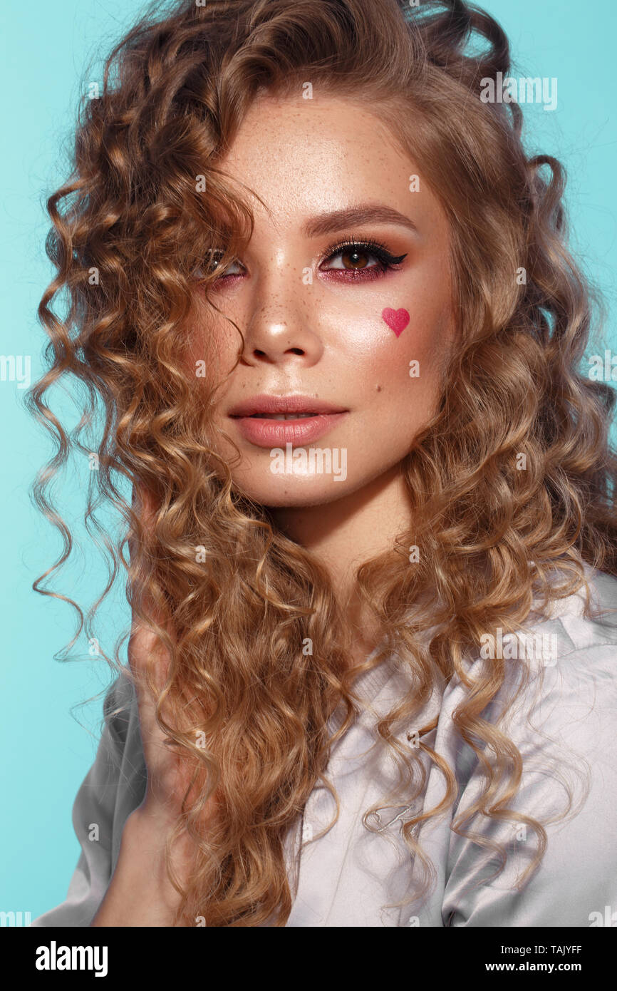 Pretty Girl With Curls Hairstyle Classic Makeup Freckles Nude Lips 