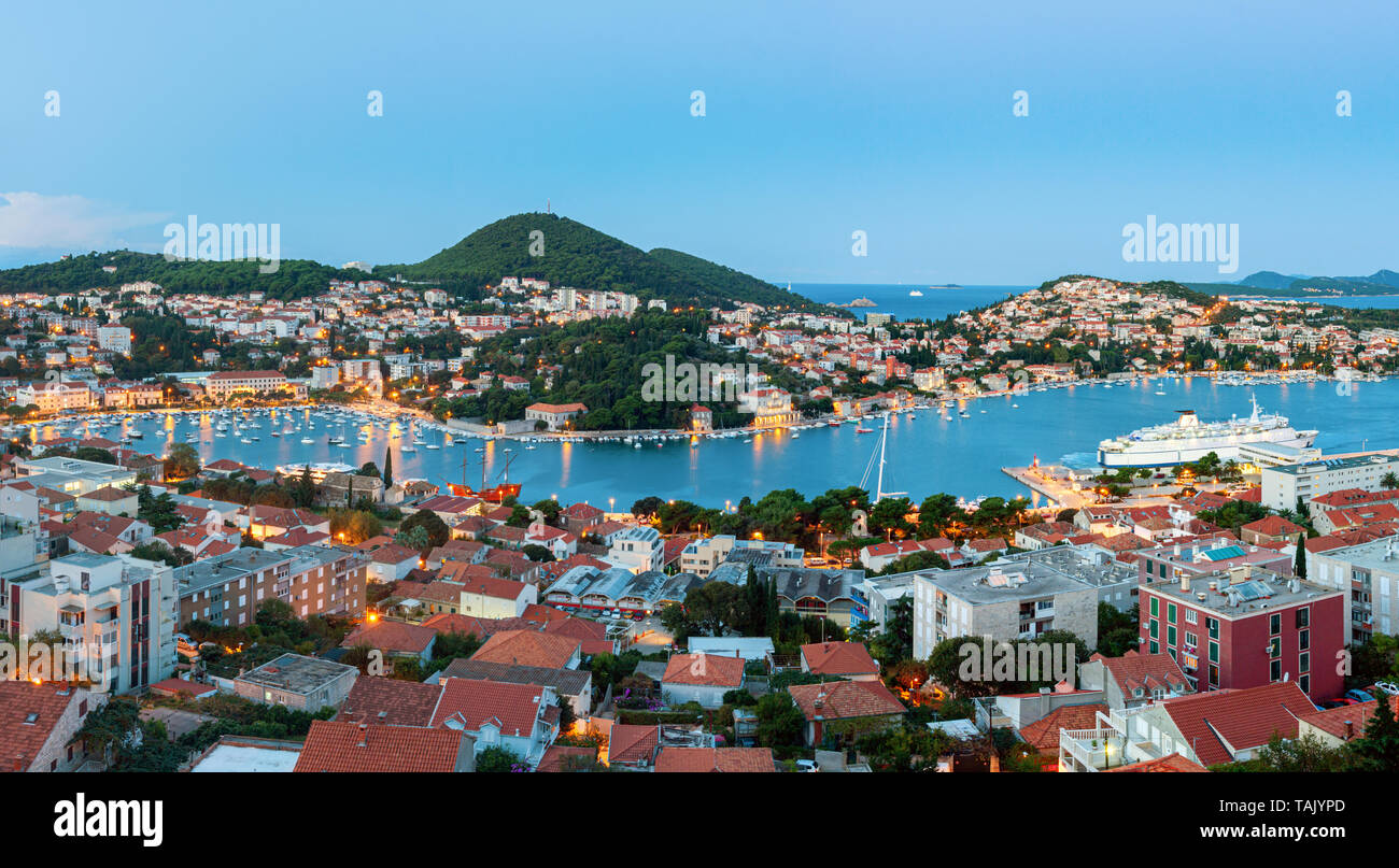 Panoramic view of Gruz neighborhood and the lapad peninsular of Dubrovnik during sunrise with the Adriatic sea in the background. Croatia. Stock Photo