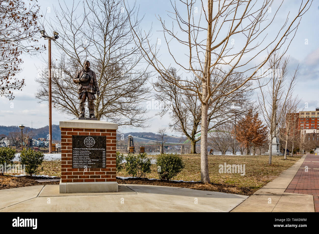 Wheeling, West Virginia/USA-March 7, 2019: A memorial statue honoring Wheeling firefighters from Local 12 who lost their lives; found along the riverf Stock Photo