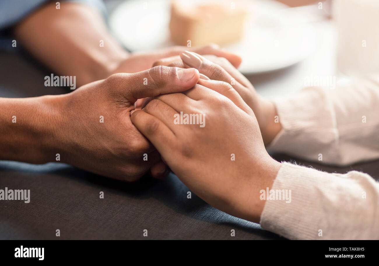 Young Black Couple Holding Hands Having Date Stock Photo Alamy