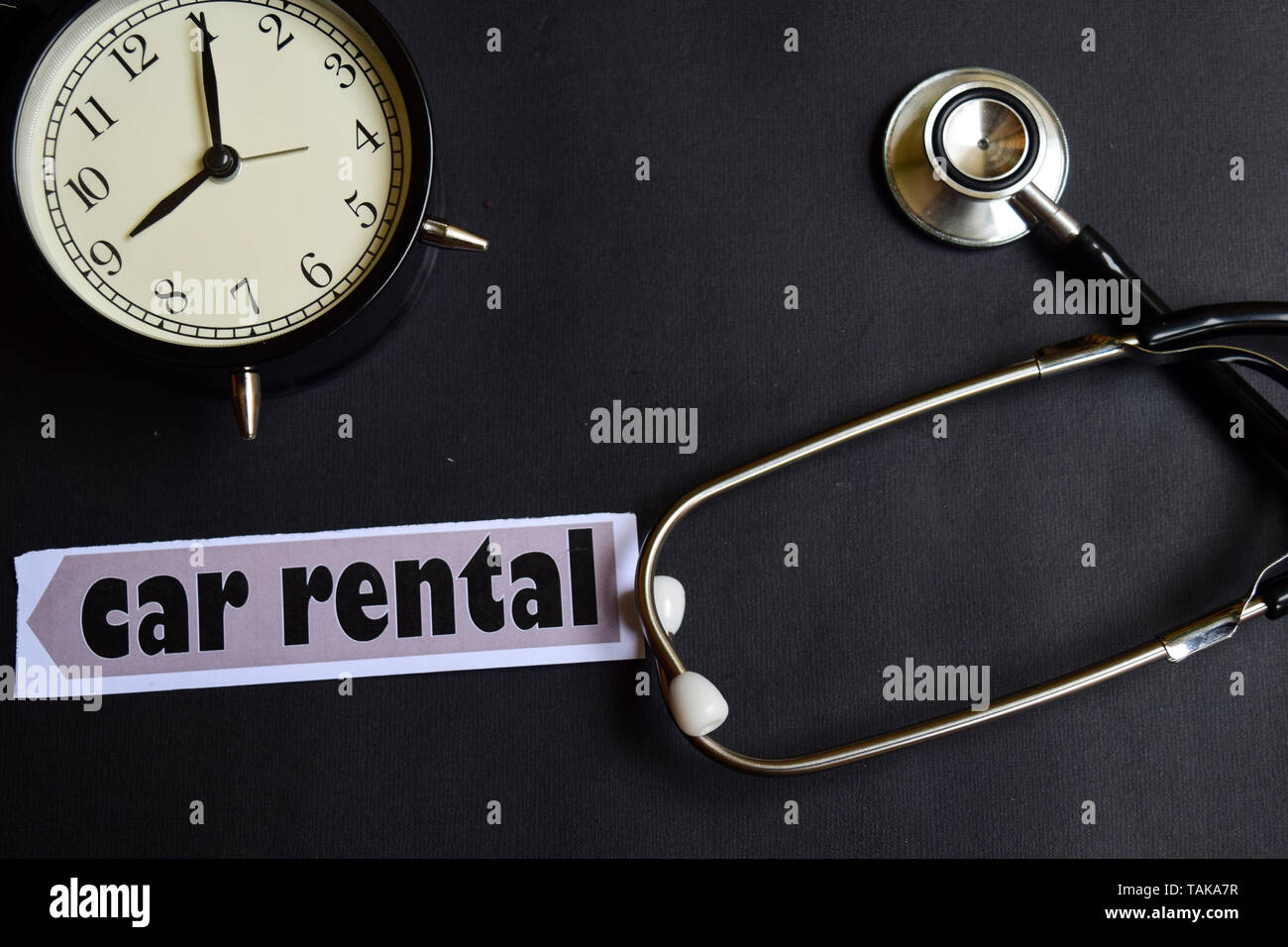 Car Rental plan on the paper with Healthcare Concept Inspiration. alarm