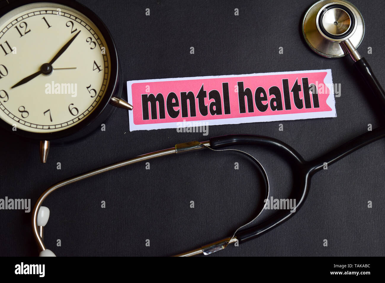 Mental Health on the paper with Healthcare Concept Inspiration. alarm