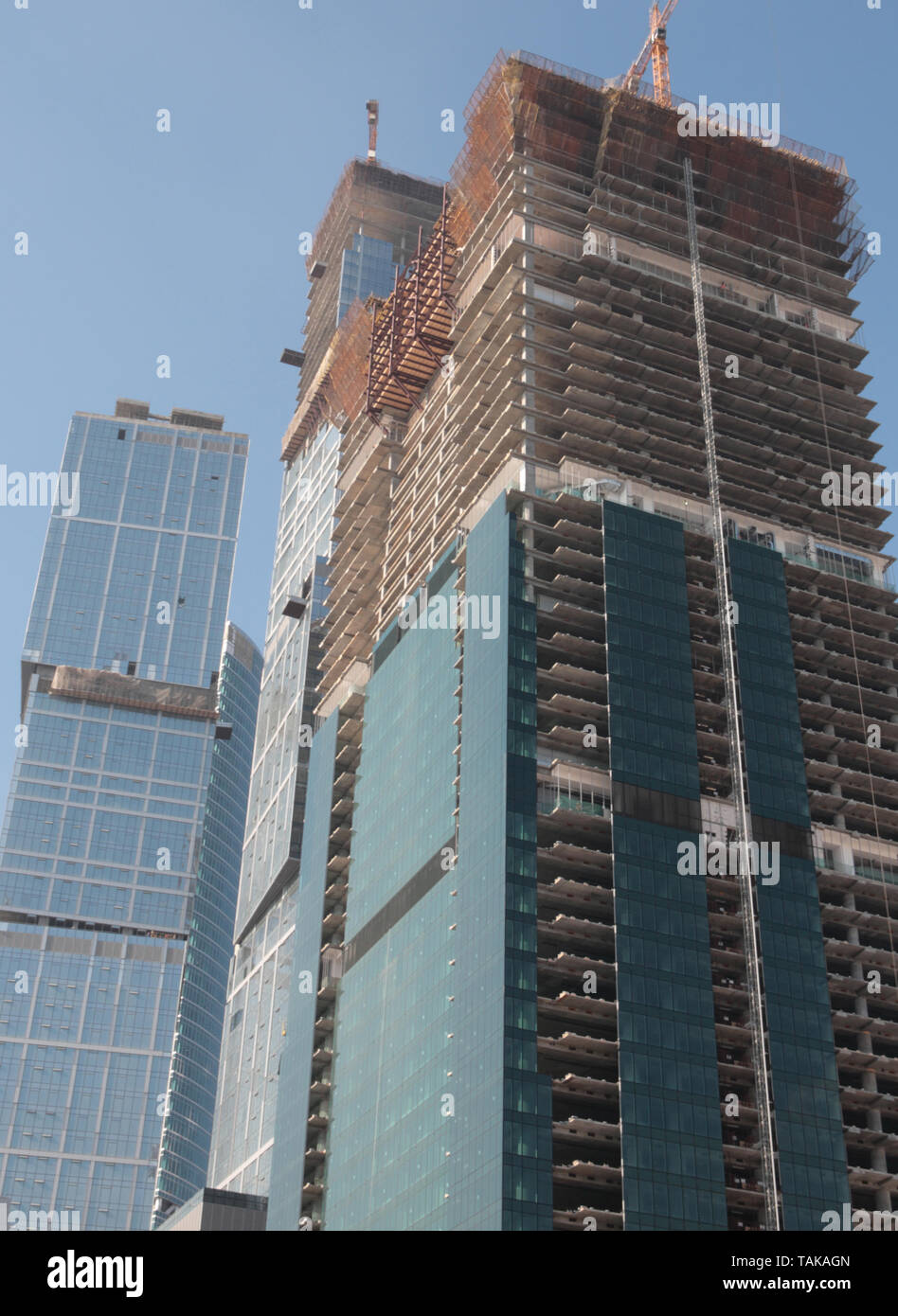 skyscraper develop on sky background at day Stock Photo - Alamy