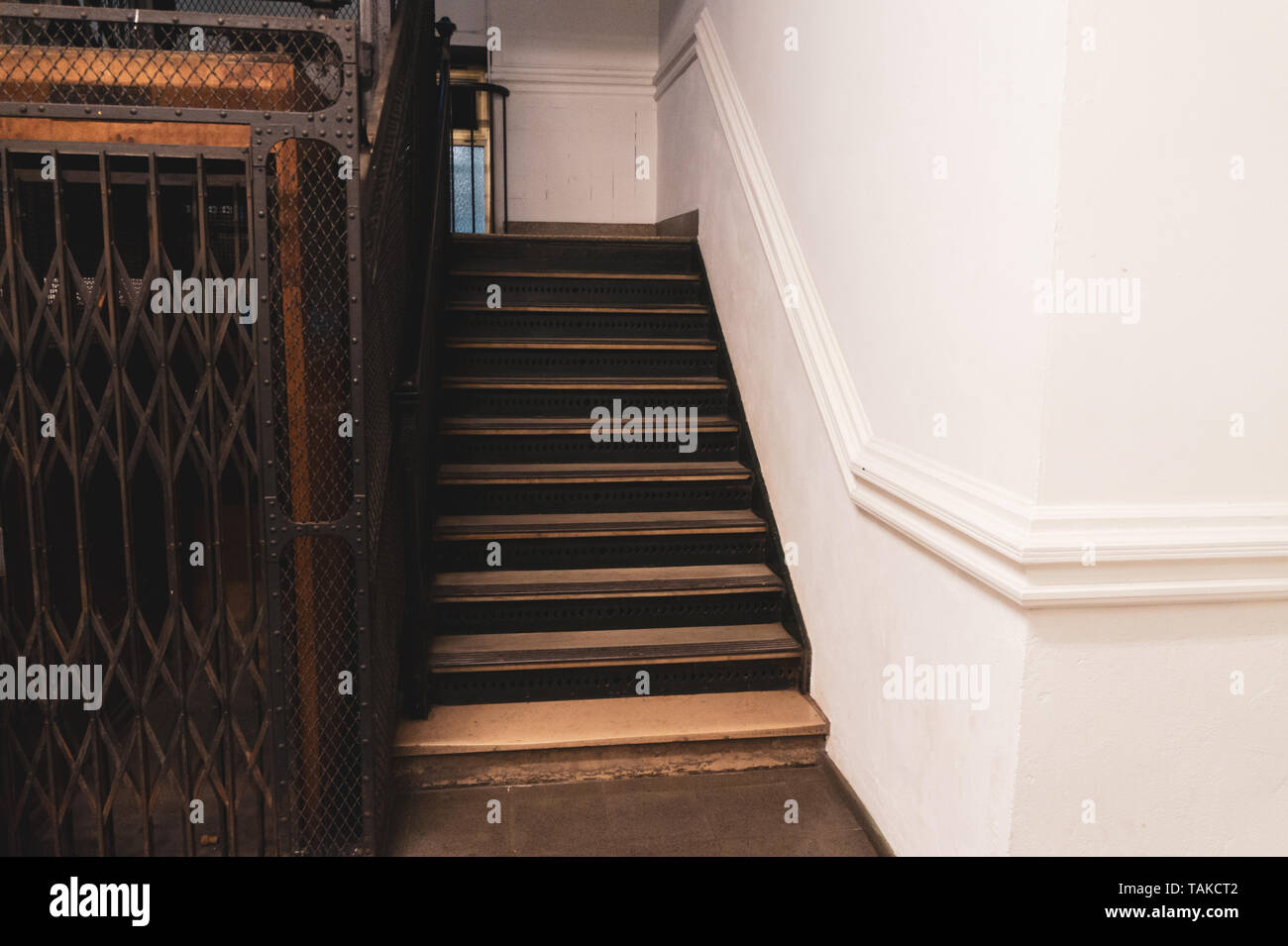 Vintage staircase and white wall Stock Photo