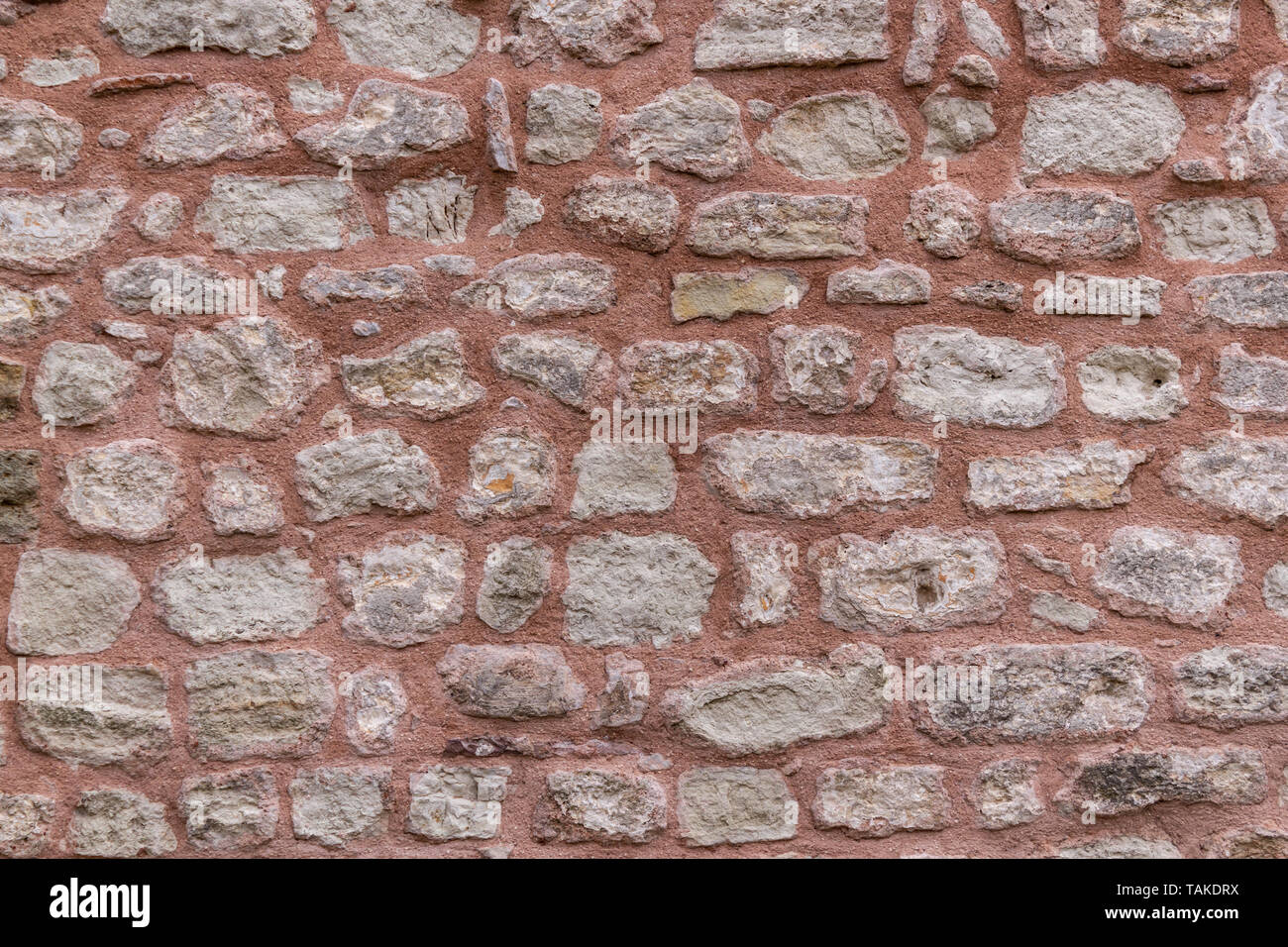 Natural stone wall background Stock Photo - Alamy