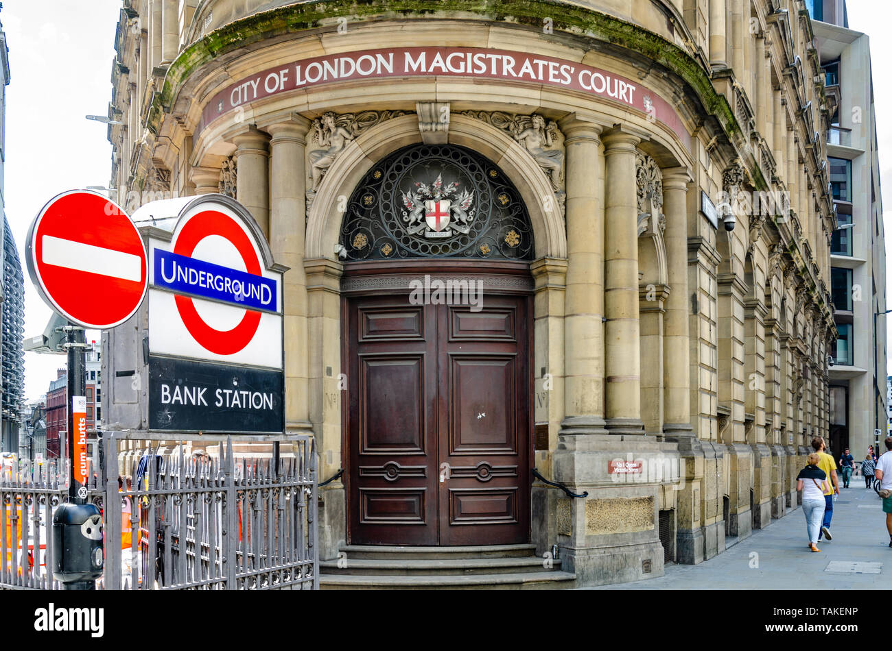 The City of London Magistrates Court on Queen Victoria Street  in London with one of the entrances / exits to Bank tube station in front. Stock Photo