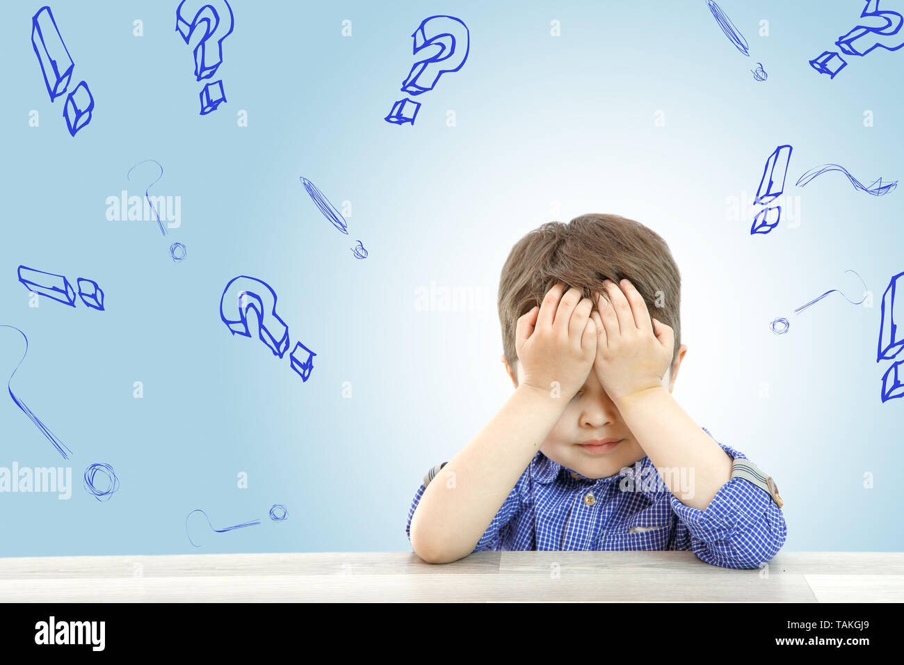 little cute boy and his questions on light background Stock Photo Alamy