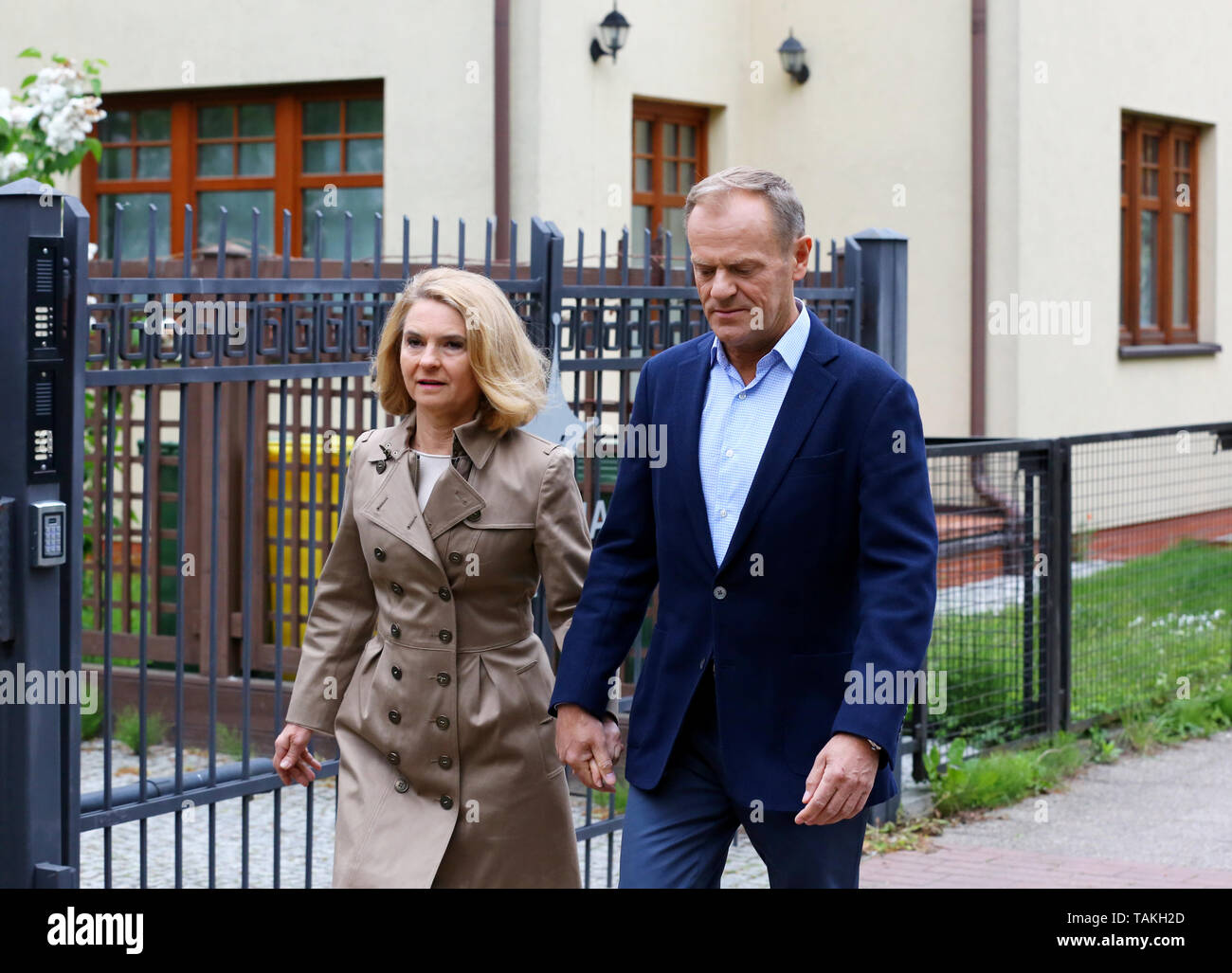 The President of the European Council Donald Tusk and his wife Malgorzata Tusk vote for the European Parliament election at a polling station on May 2 Stock Photo