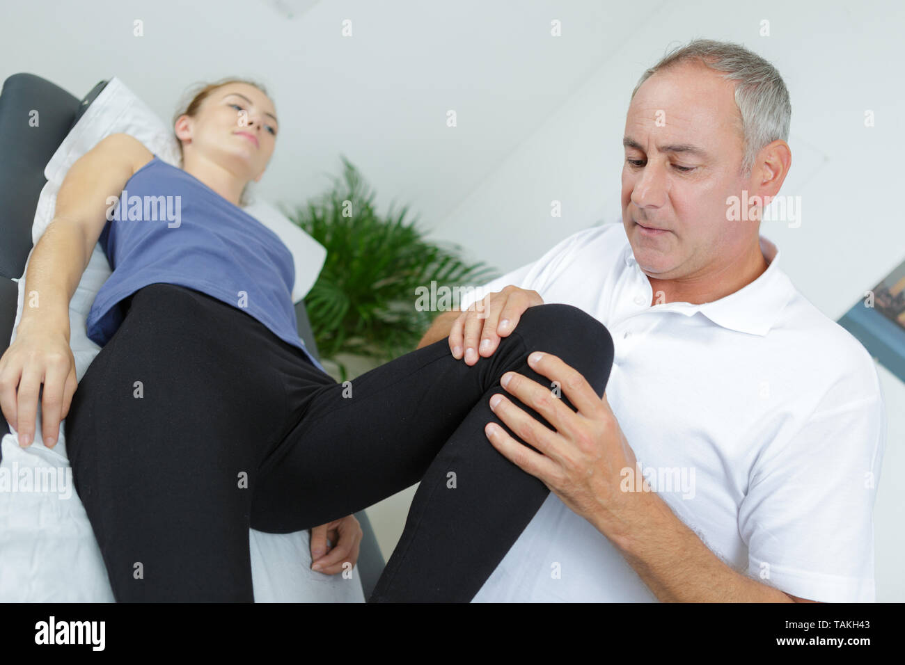 therapeutic manipulation of the knee Stock Photo Alamy