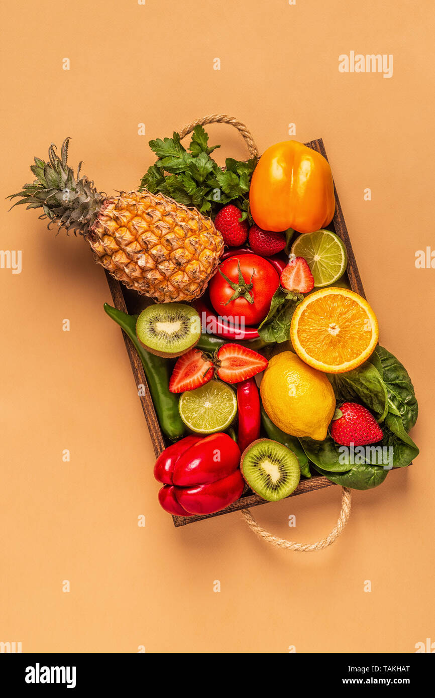 Fruits and vegetables rich in vitamin C in box. Healthy eating. Top