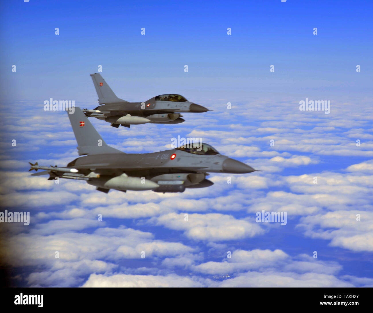 Royal Norwegian Air Force F-16C fighter aircraft fly in formation during NATO exercise Arctic Challenge May 24, 2019 over Finland. Stock Photo