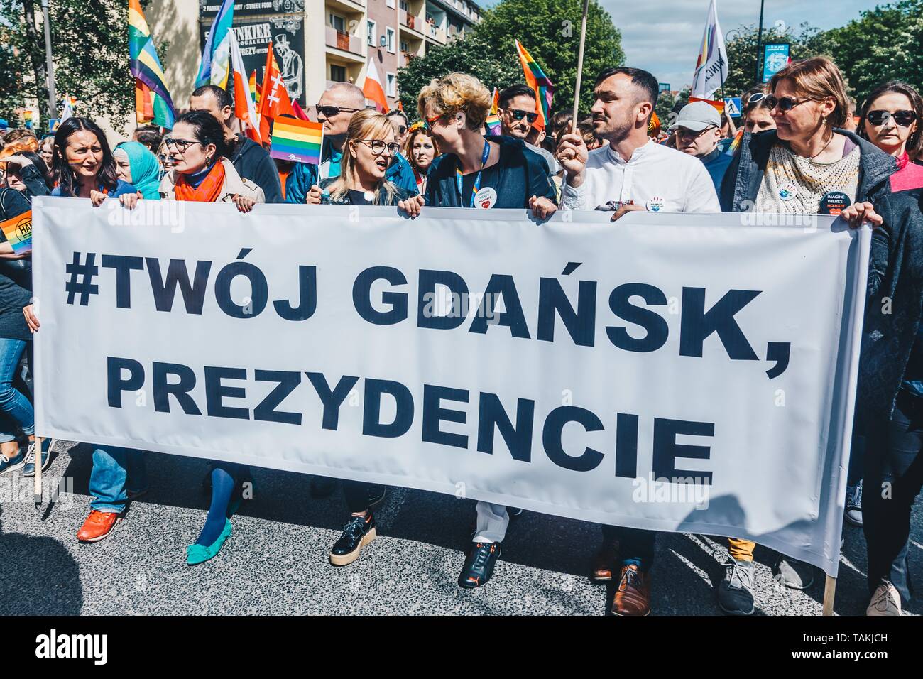 The 5th Tricity Equality March – Love can only combine, strolls through the streets on May 25, 2019 in Gdansk, Poland.   The banner reads: #Your Gdans Stock Photo
