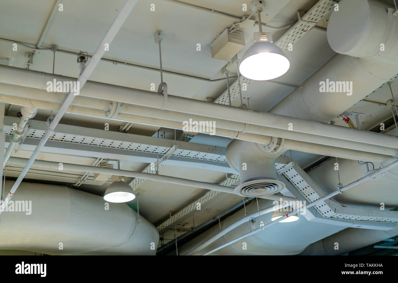 Air duct, wiring and plumbing in the mall. Air conditioner pipe, wiring