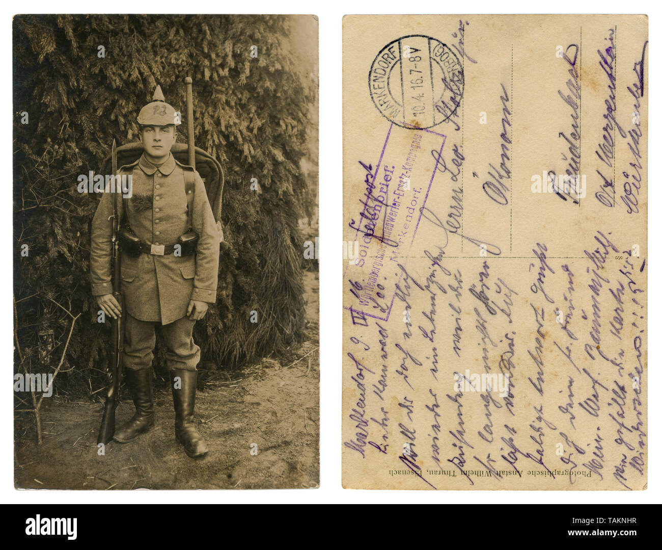 German historical photo: a handsome young soldier in full gear in military uniform with weapons, a rifle with bayonet knife, entrenching shovel, 1916 Stock Photo