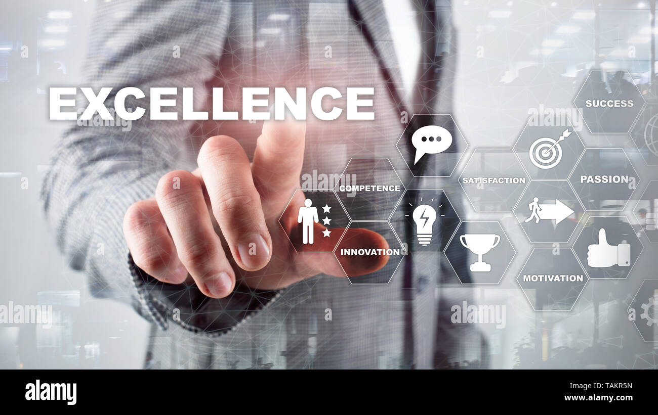 Achieve Business Excellence as concept. Pursuit of excellence. Blurred business center background. Stock Photo