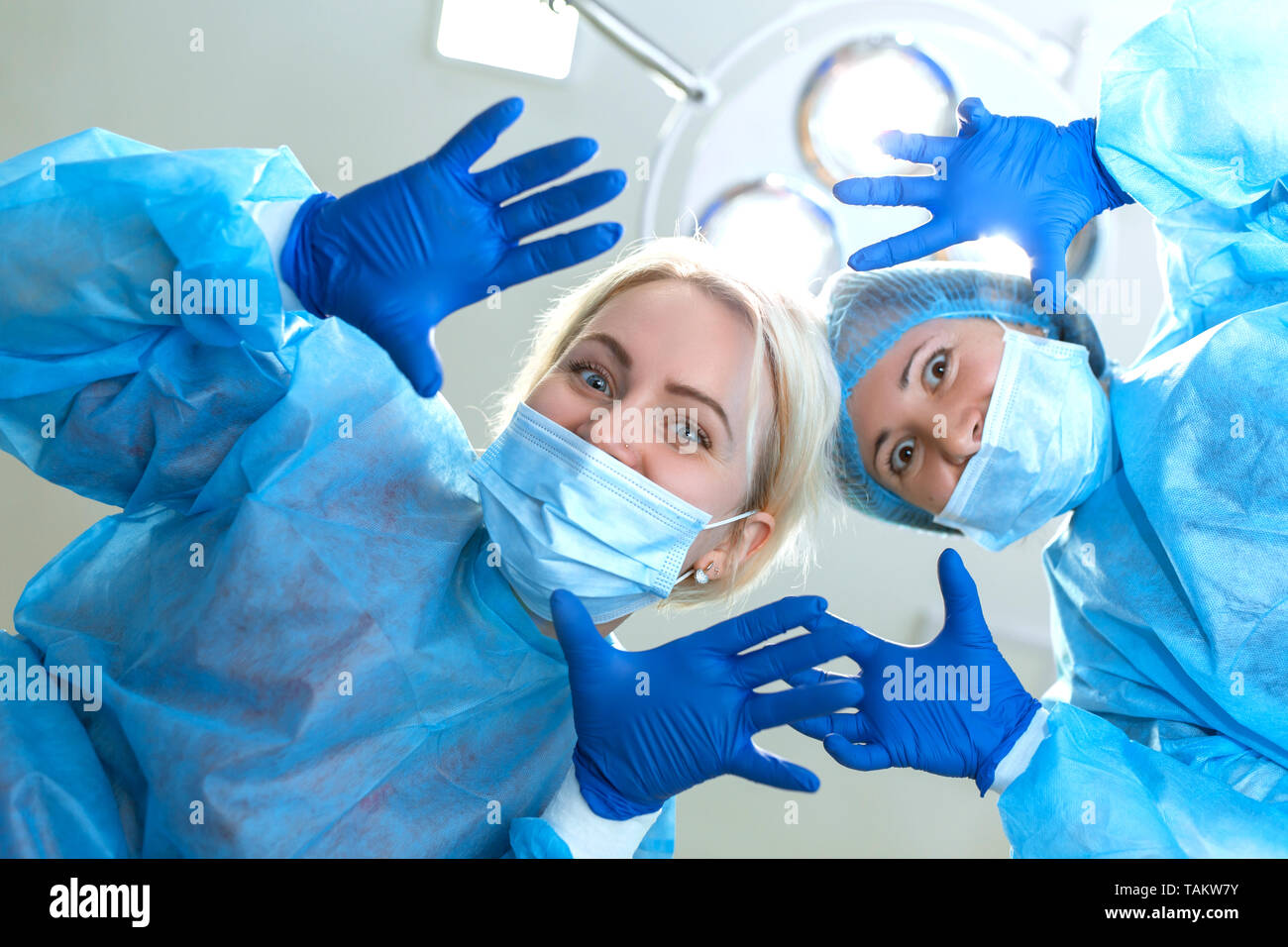 young women surgeons funny kidding on camera at operation room background Stock Photo - Alamy young women surgeons funny kidding on camera at operation room background Stock Photo - Alamy
