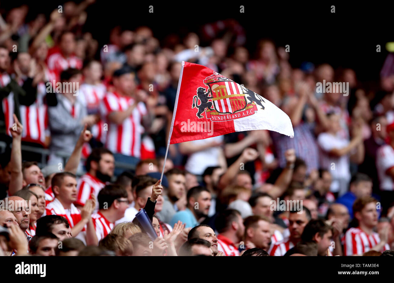 Sunderland fans in the stands show their support prior to the beginning the Sky Bet League One Play-off final at Wembley Stadium, London. Stock Photo