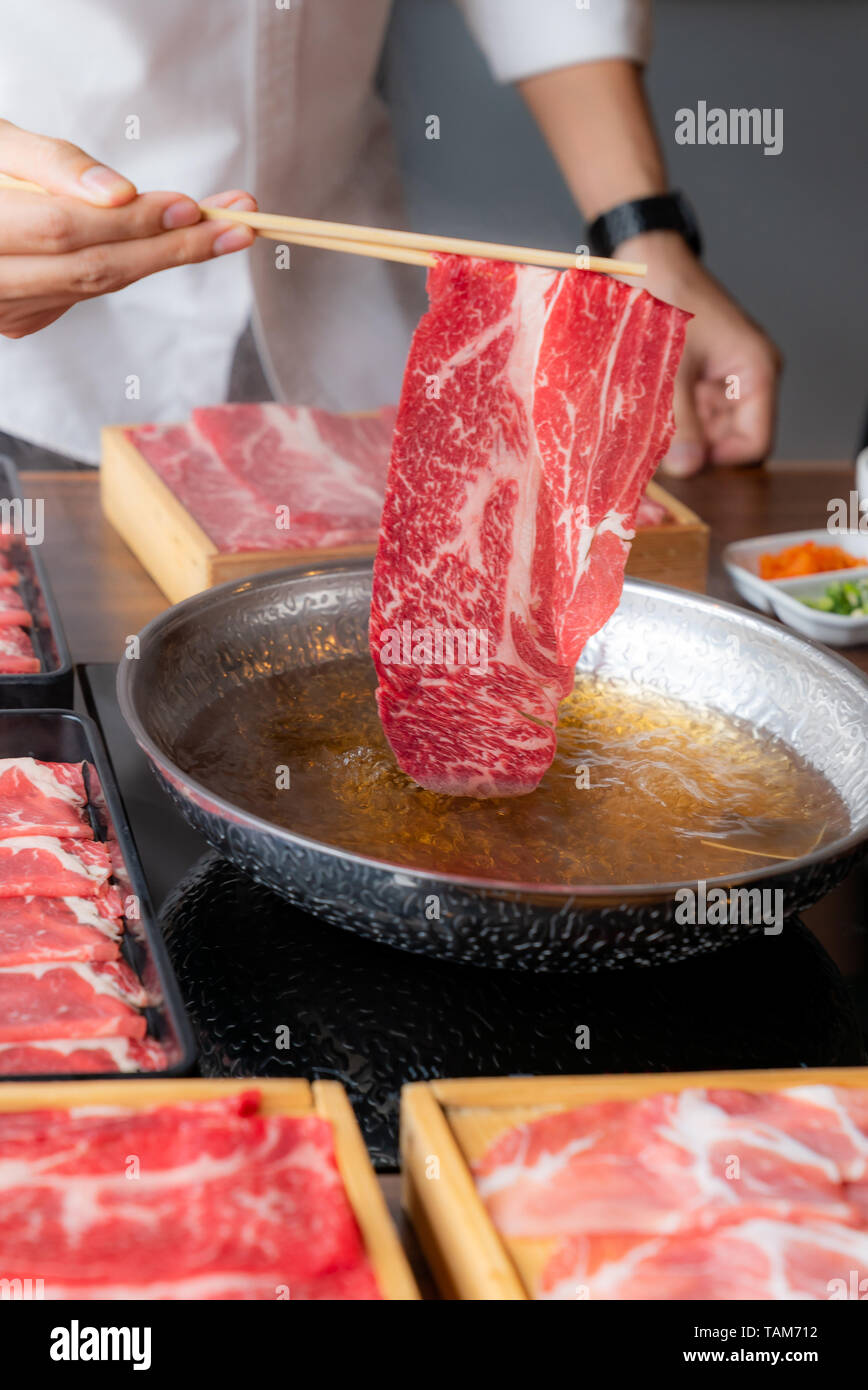 Cooking of japanese wagyu beef Shabu Shabu set hot pot Stock Photo Alamy