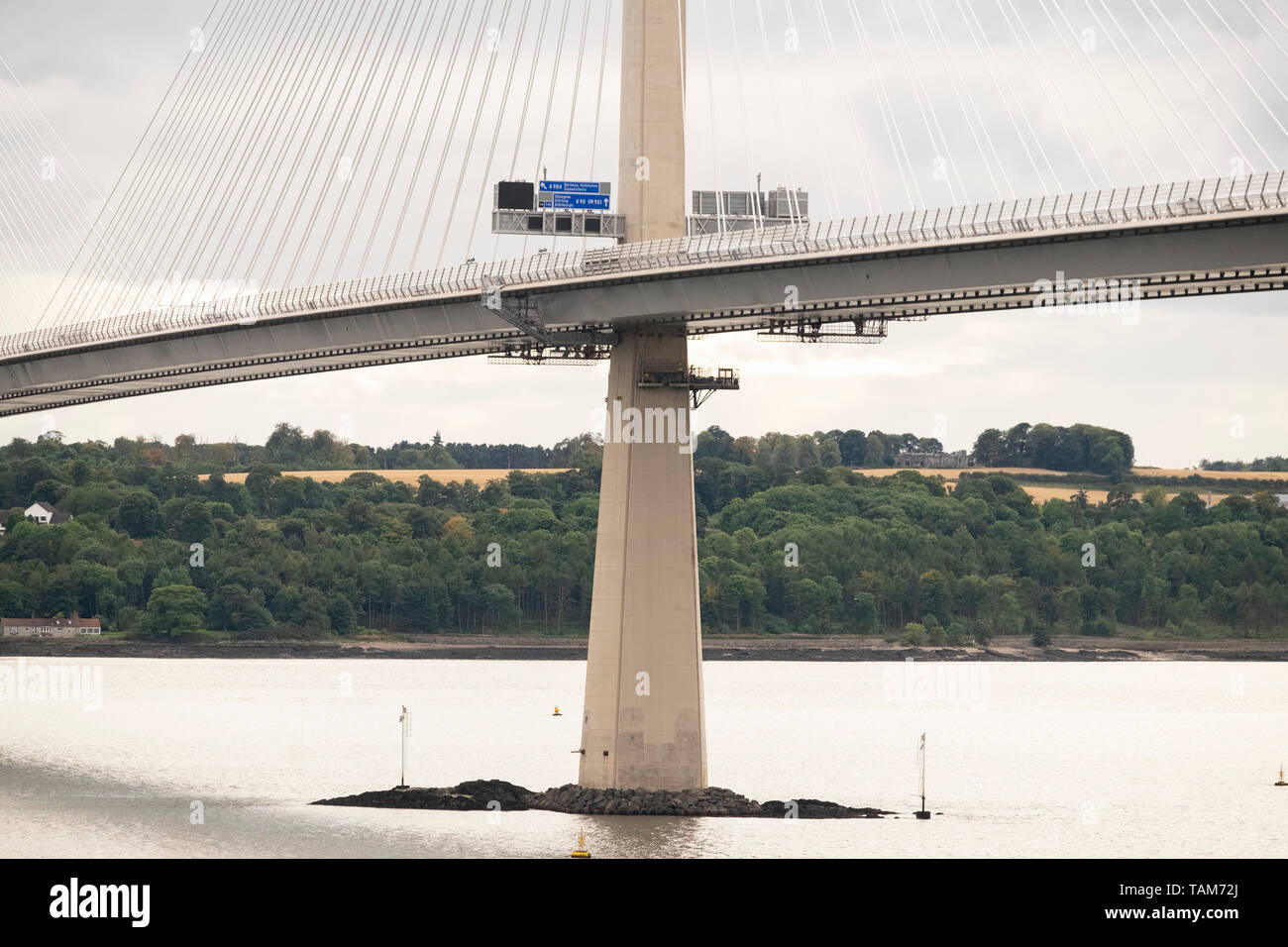 Detail of new Queensferry Crossing road bridge  near Edinburgh,Scotland, UK, showing support pillar and road signs Stock Photo