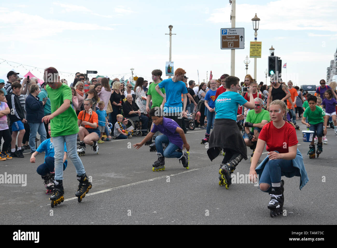 Roller skaters from Skate World at Eastbourne Sunshine Carnival, Sussex, England, UK. May Bank Holiday 2019 Stock Photo