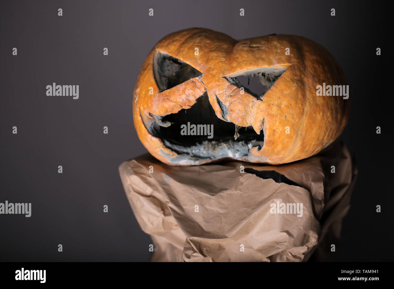 horror of halloween. horror face cut on pumpkin for halloween party celebration, copy space. scary and fear. jack o lantern with evil expression. A Stock Photo