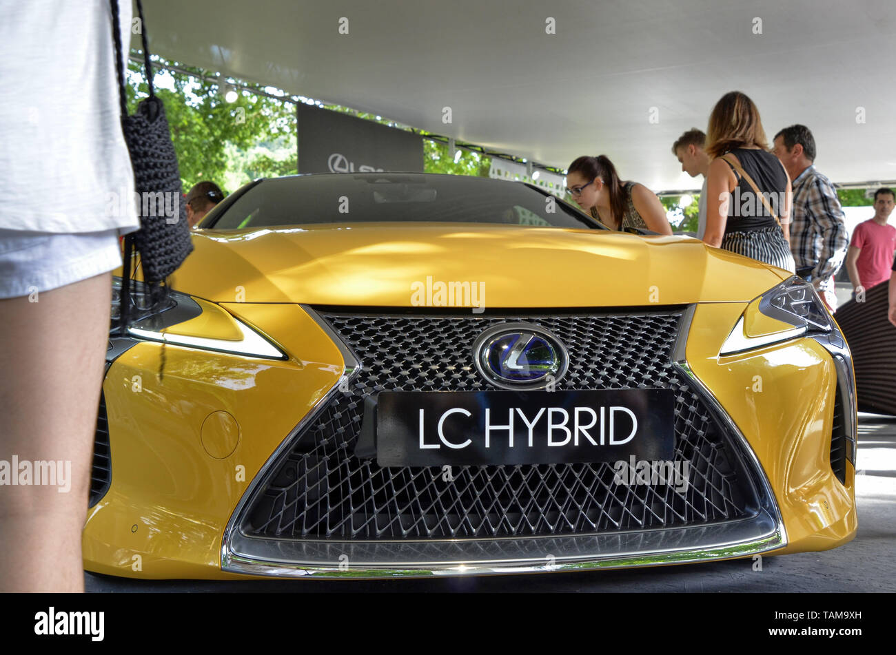 Turin, Piedmont, Italy. June 2018. At the Valentino park, the motor show. At the Lexus stand, the yellow-colored lc attracts the attention of the peop Stock Photo
