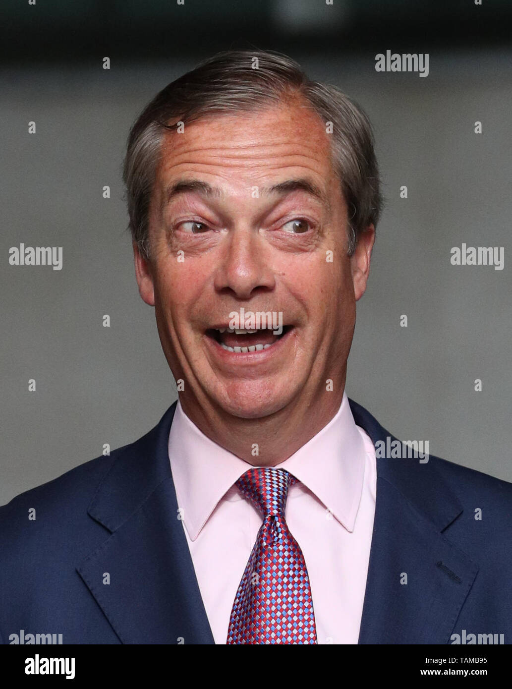 Brexit Party leader Nigel Farage leaving New Broadcasting House in London after giving an interview on the Today programme following the European Parliamentary election results. Stock Photo