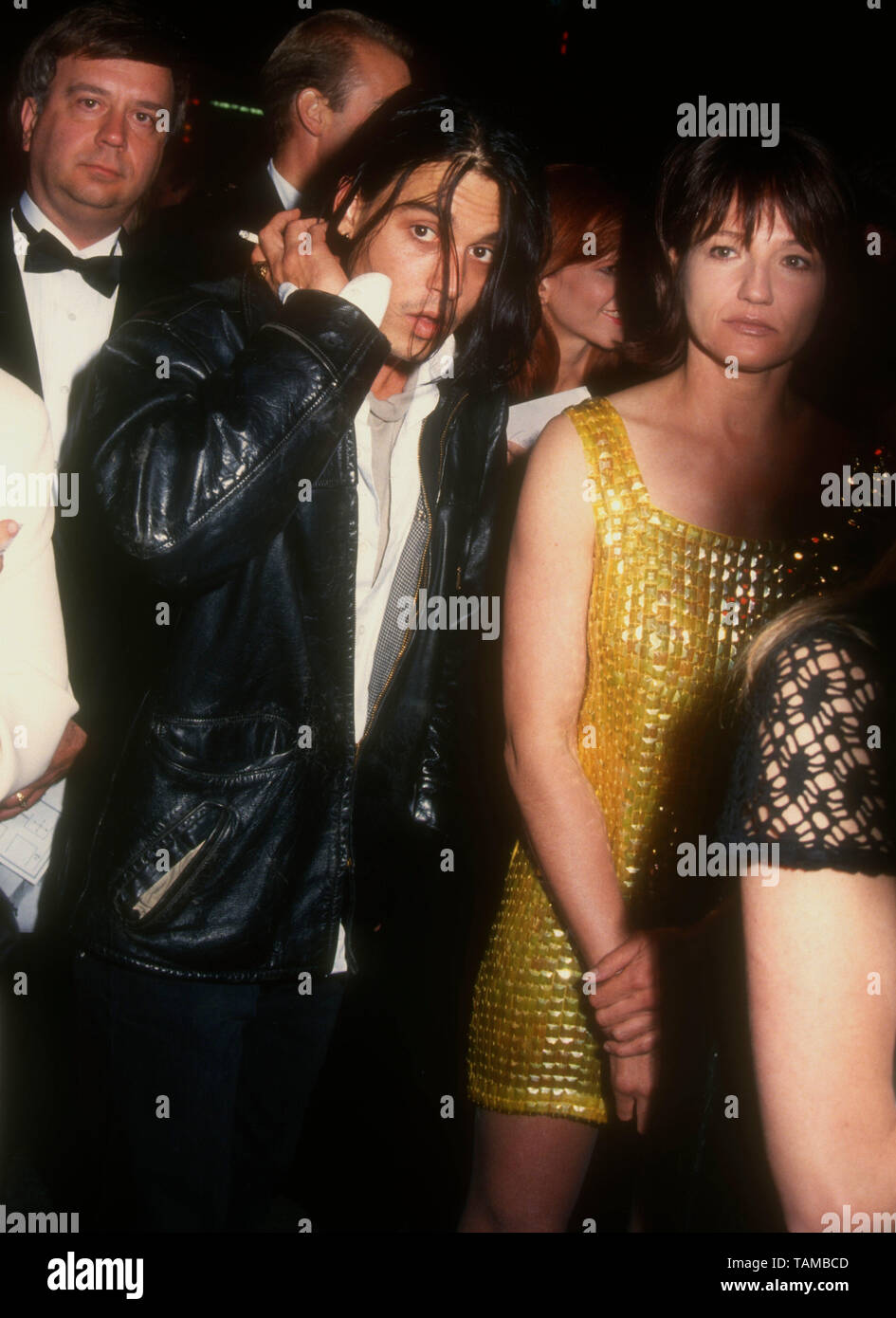 Hollywood, California, USA 4th May 1994 Actor Johnny Depp and actress Ellen  Barkin attend 'APLA Fashion Show Honoring Isaac MIzrahi' on May 4, 1994 at  Mann's Chinese Theatre in Hollywood, California, USA.