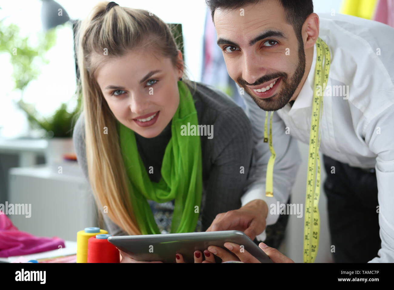 Gadget Technology in Sewing Tailoring Concept Stock Photo